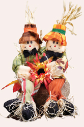Scarecrow Couple Sitting on Sack