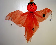 3' Hanging Orange Pumpkin Ghost w/Cans